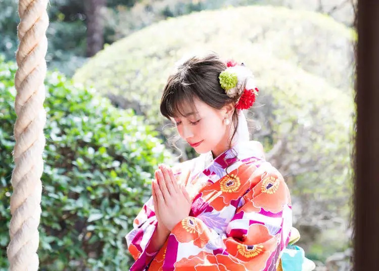 praying in Japanese temple